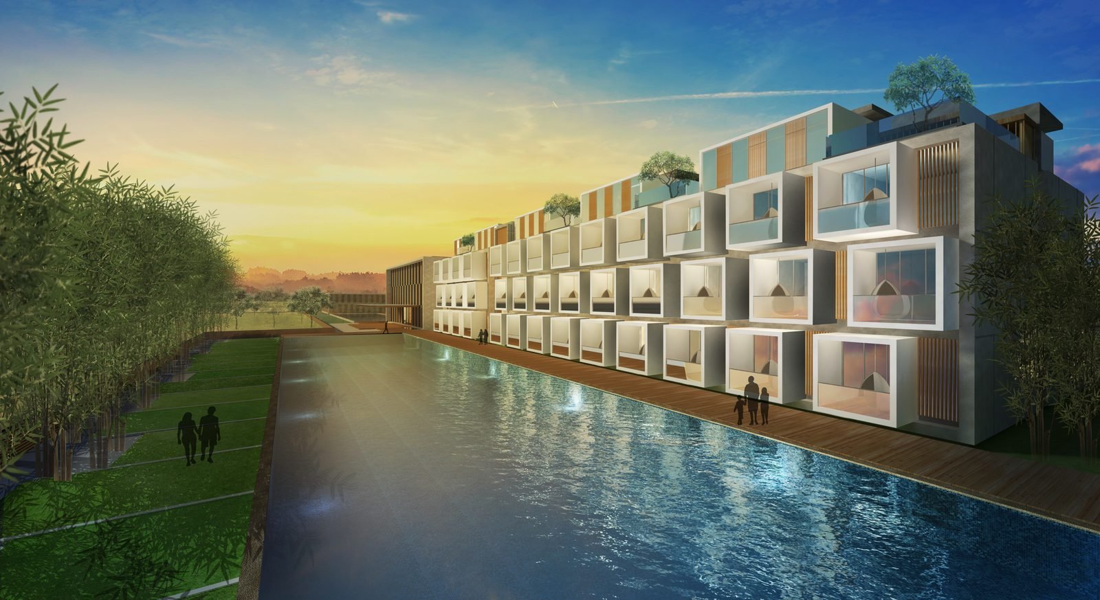 Resort villas along a pool at golden hour